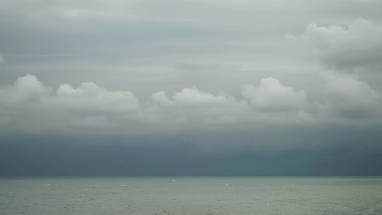 Dark Storm Clouds Gathering Over the Ocean