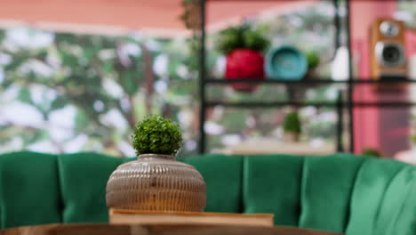 modern empty home interior featuring green chairs and cozy wooden table