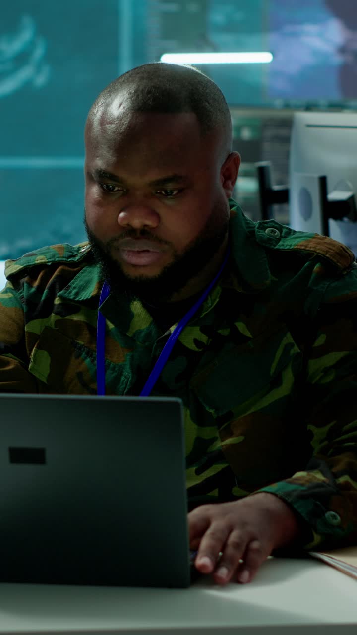 Vertical Video Army intelligence expert utilizes modern computer systems and satellite imagery