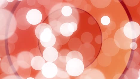 Animation-of-spots-of-light-over-red-circles-patterned-background