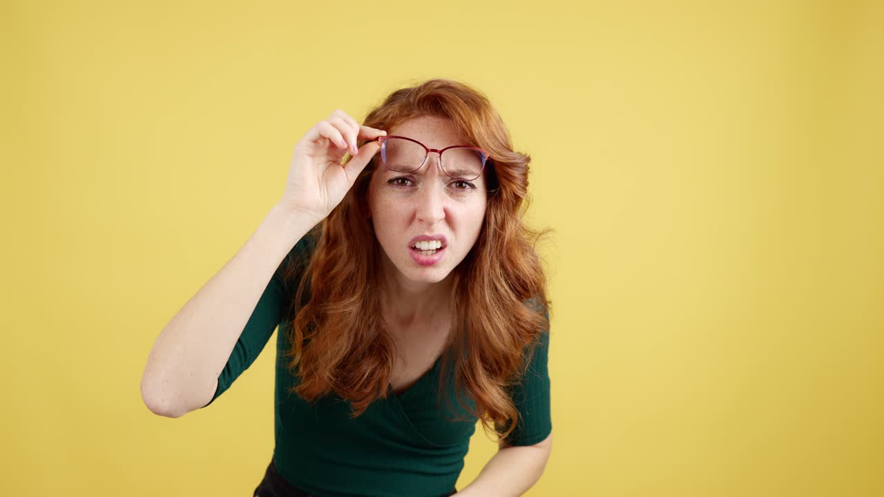 Woman Squinting and Looking Confused