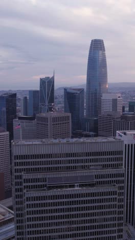 Vertical-Aerial-View-of-Downtown-San-Francisco-CA-USA,-Revealing-Shot-of-Skyscrapers-and-Towers-in-Financial-District