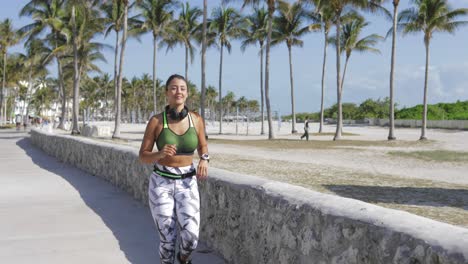 sporty woman jogging in park