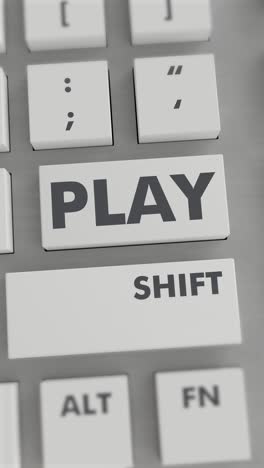 pulsando el botón de reproducción en el teclado vídeo vertical