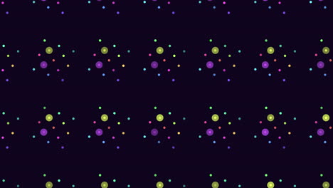 puntos coloridos dispuestos en un patrón circular simétrico sobre un fondo negro