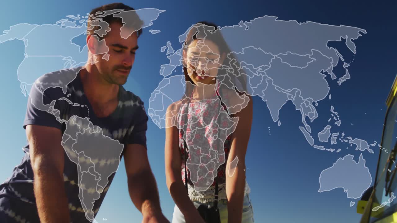Animation of world map over caucasian couple talking