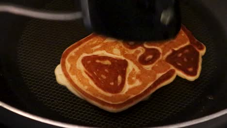 pancake shape of pug dog flip over to reveal closeup