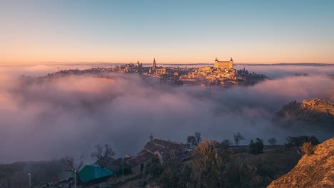 panoramic view timelapse of toledo imperial city during sunset with low clouds fog day to night