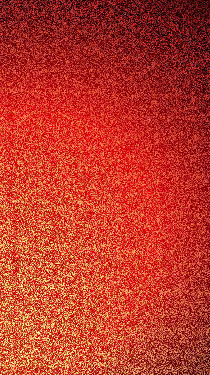 Abstract Red Orange Shimmering Particles on Dark Background