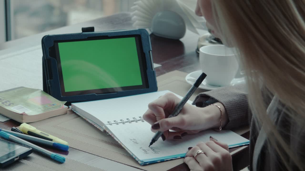 The Freelancer Girl Works In Cafe Using Touchpad