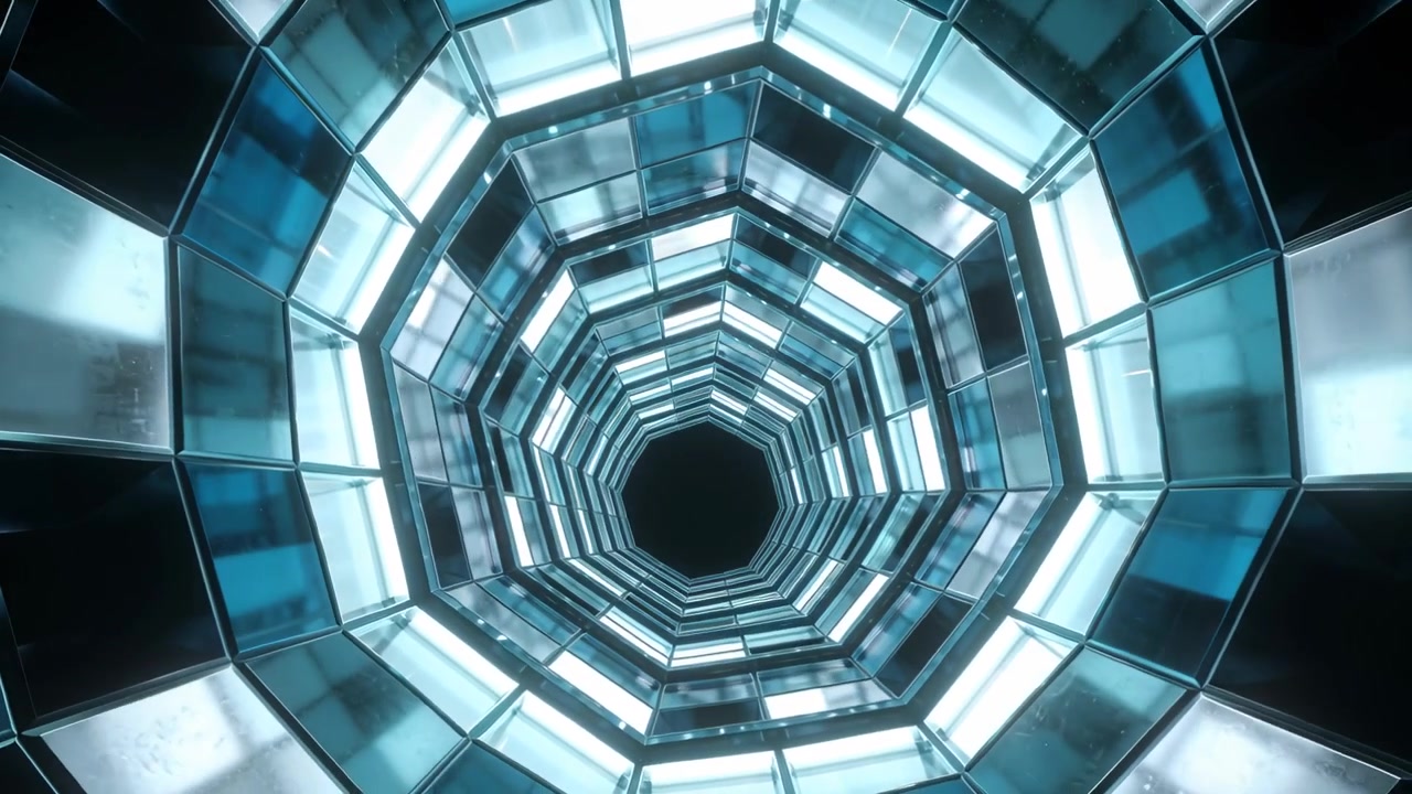 Iniciando la reproducción, la cámara se desliza a través de un túnel octogonal iluminado con anillos de cristal y luz cian.