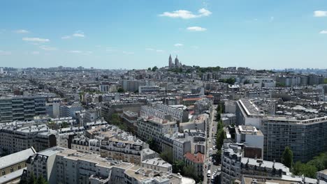 paris 17th district or 17ã¨me arrondissement with montmartre and sacre coeur or sacred heart basilica in background-1