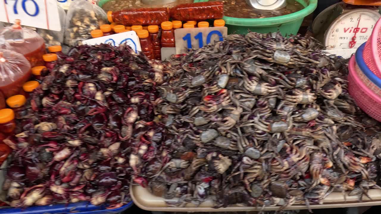 Various crabs displayed for sale at market