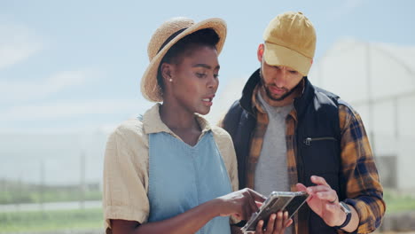 farmers discussing technology on farm