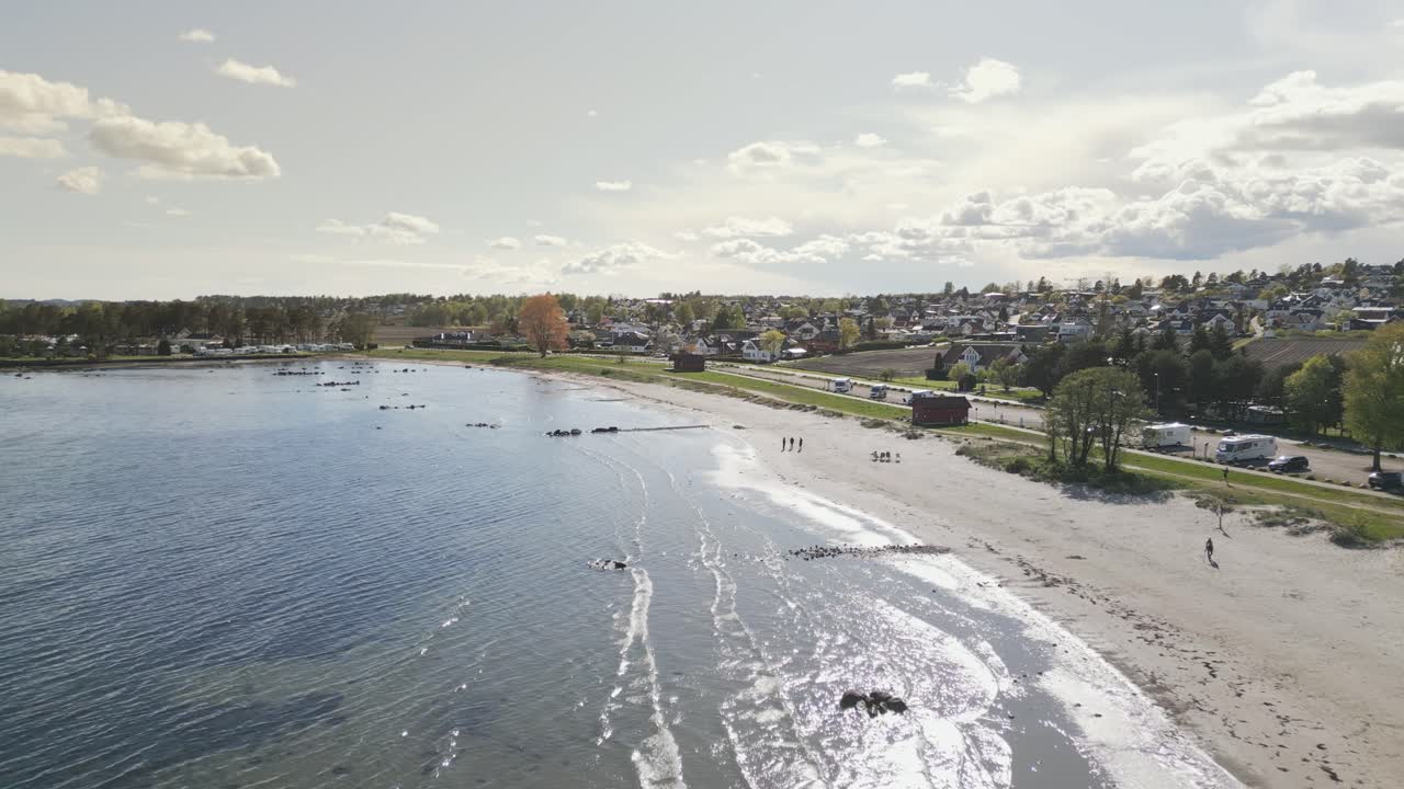 Drone view of Ringshaugstranda Beach on a sunny day, located near Tønsberg in Norway.