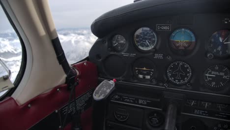 pilot's view small single engine airplane cockpit interior in flight