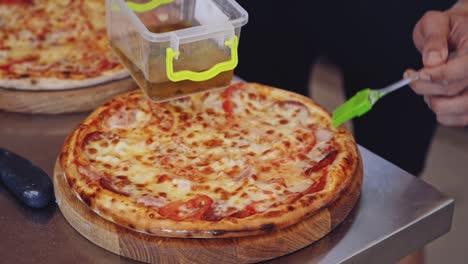 process of making pizza. close up of fresh original pizza preparation