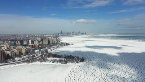 aerial view of the south side of chicago, sunny, winter day in illinois, usa - descending, drone shot