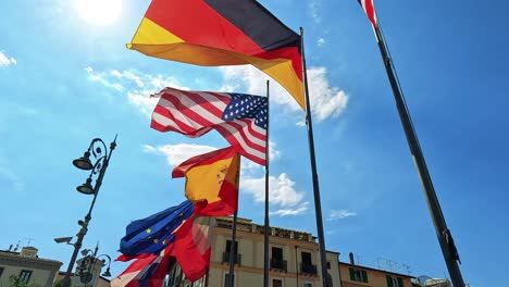 colorful flags flutter under a bright sky