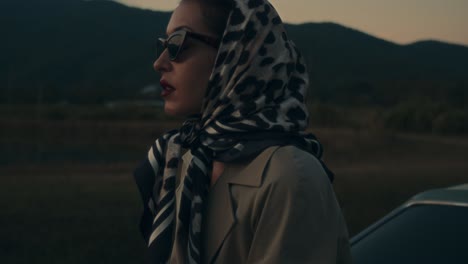 vintage woman by classic car