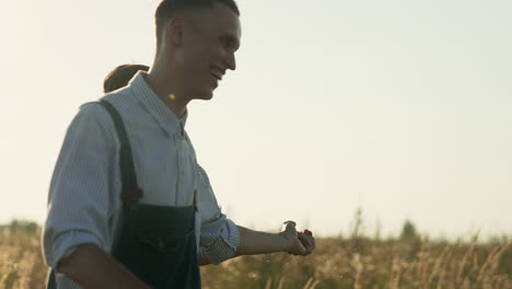 men holding hands and hugging outdoors