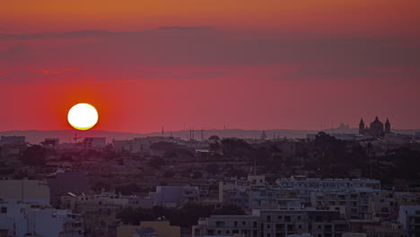 beautiful orange sunrise over the city of rabat in the northern region of malta
