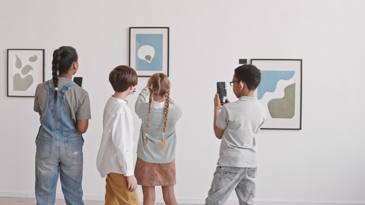 Children Taking Pictures of Paintings