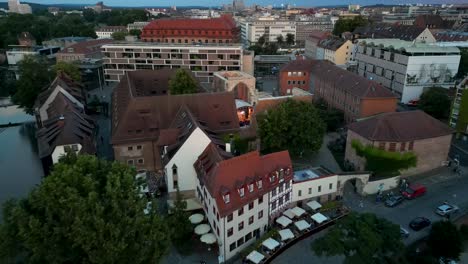 4k aerial drone video of band performing in the ruins of a medieval church in downtown nurnberg, germany