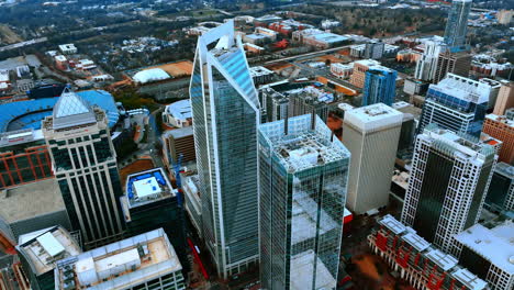 beautiful mirror facades of skyscrapers in the uptown of dallas, texas, usa. sunny scenery of the city from drone