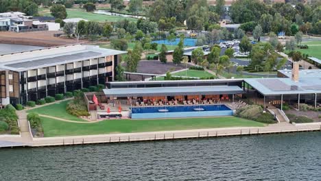 close and low aerial view of swimming pool and outdoor dining area at the sebel hotel in yarrawonga