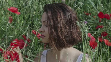 young woman outdoors in the countryside relaxing