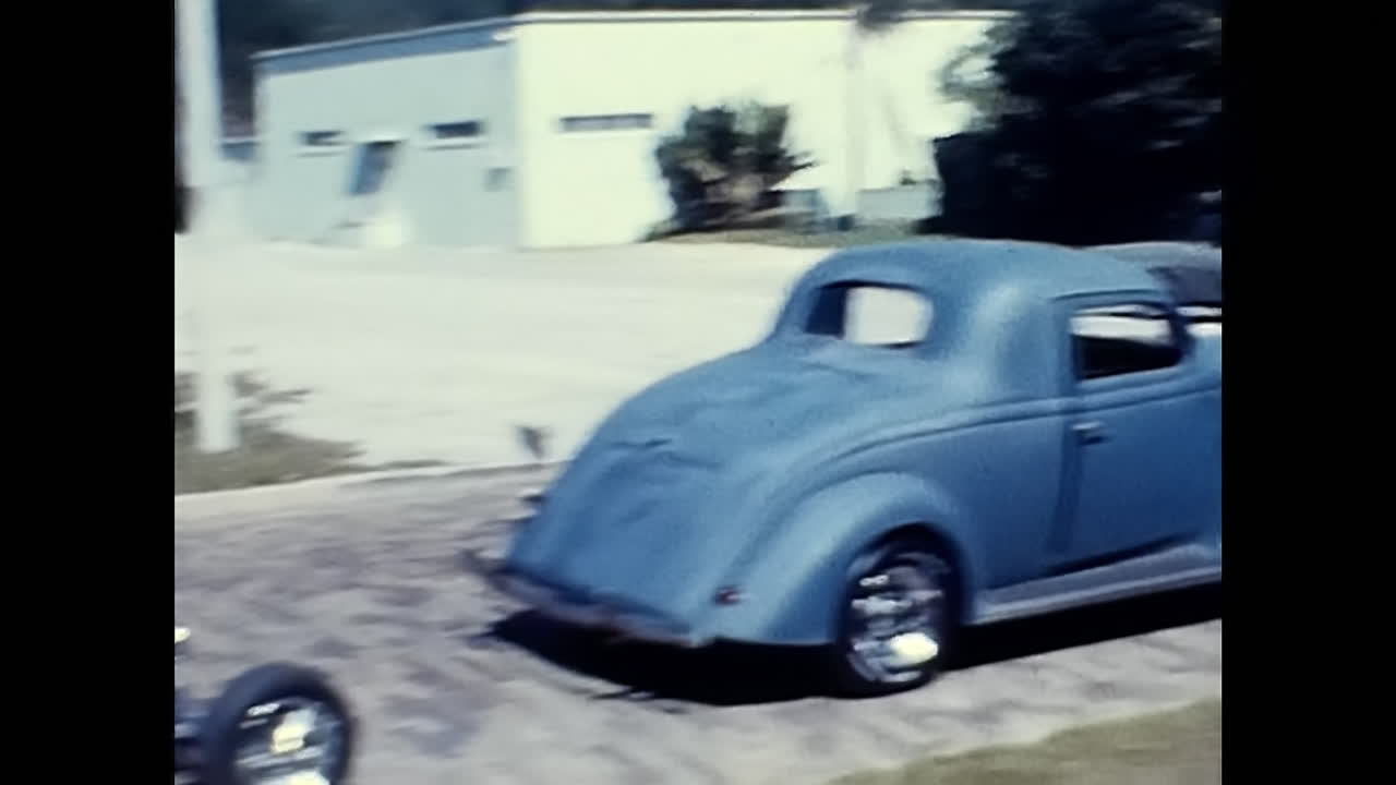 Cars at 1970s Old Car Show in the USA. CIRCA USA - 1970s: Cars at an old car show in the USA during the 1970s.