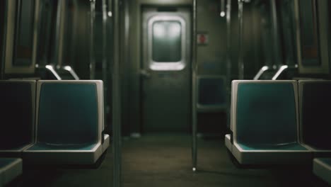 inside of the old non-modernized subway car in usa