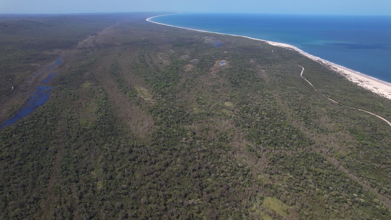 Aerial View Of Island Of K'gari and Great Sandy Strait River In Wide Bay-Burnett Region Of Queensland, Australia.