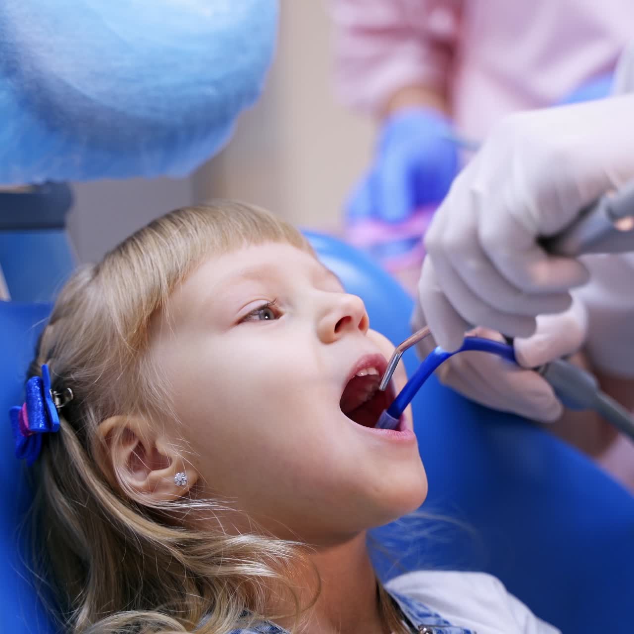 Cute girl in dental clinic