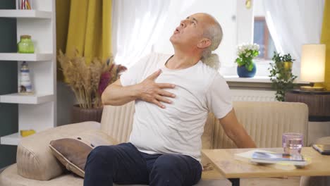 sick old man with rapid breathing. the old man cannot control his breathing.