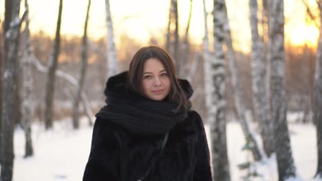 woman in winter forest