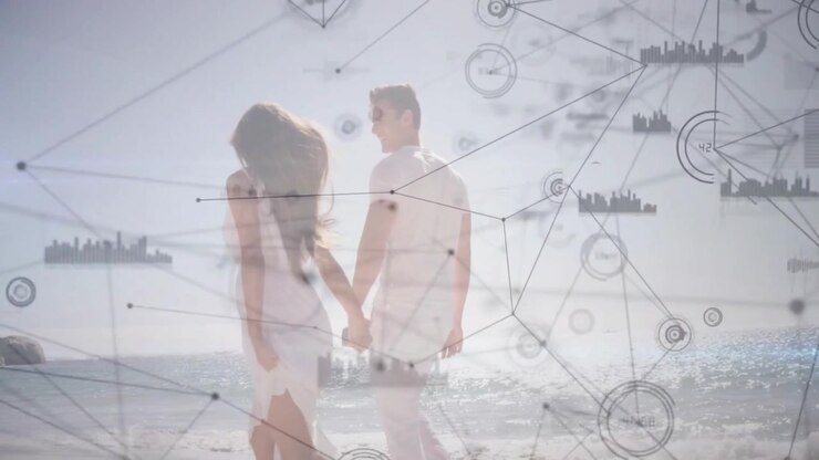 couple lifting clasped hands starting beach walk revealing sunlit horizon as tech visuals shifting