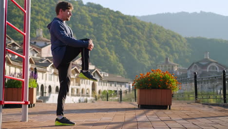 man stretching outdoors