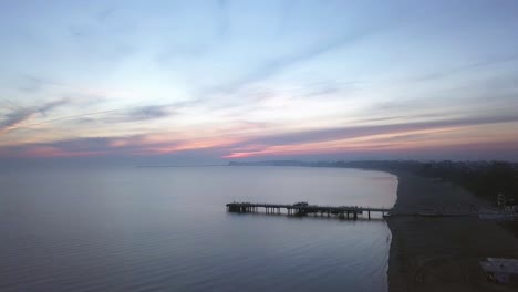 drone footage of a sunrise over the sea
