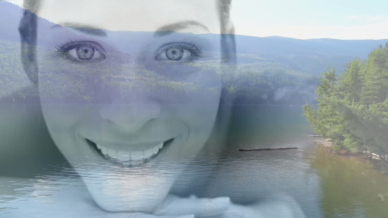 rostro de una mujer sonriente sobre un lago sereno y una animación de paisaje de montaña