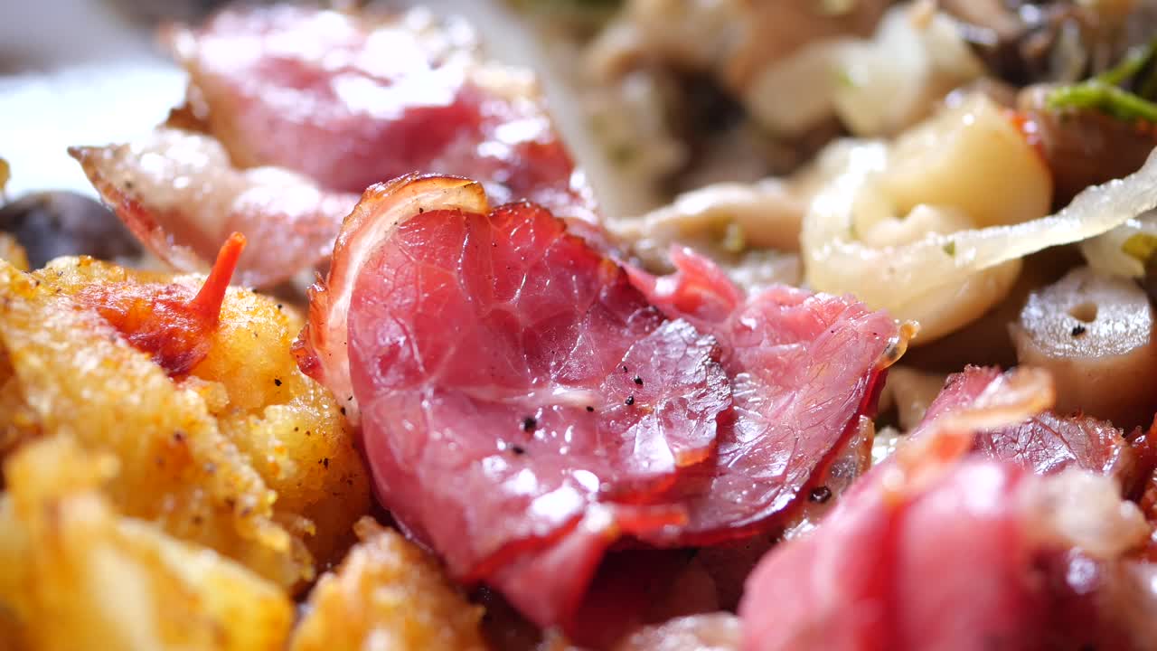 Close-up of Sliced Meat and Potatoes