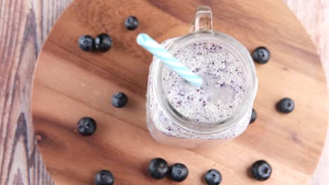 blueberry smoothie in a glass jar