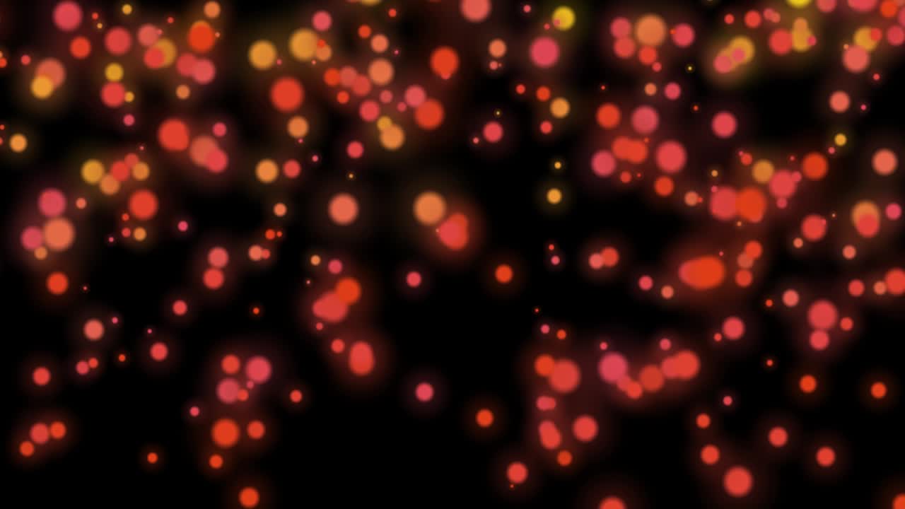 el vuelo de círculos borrosos bokeh. animación de movimiento círculos borrados de rojo, naranja y amarillo sobre un fondo negro. efecto desfocado. lámpara de lava. composición horizontal, calidad de video 4k