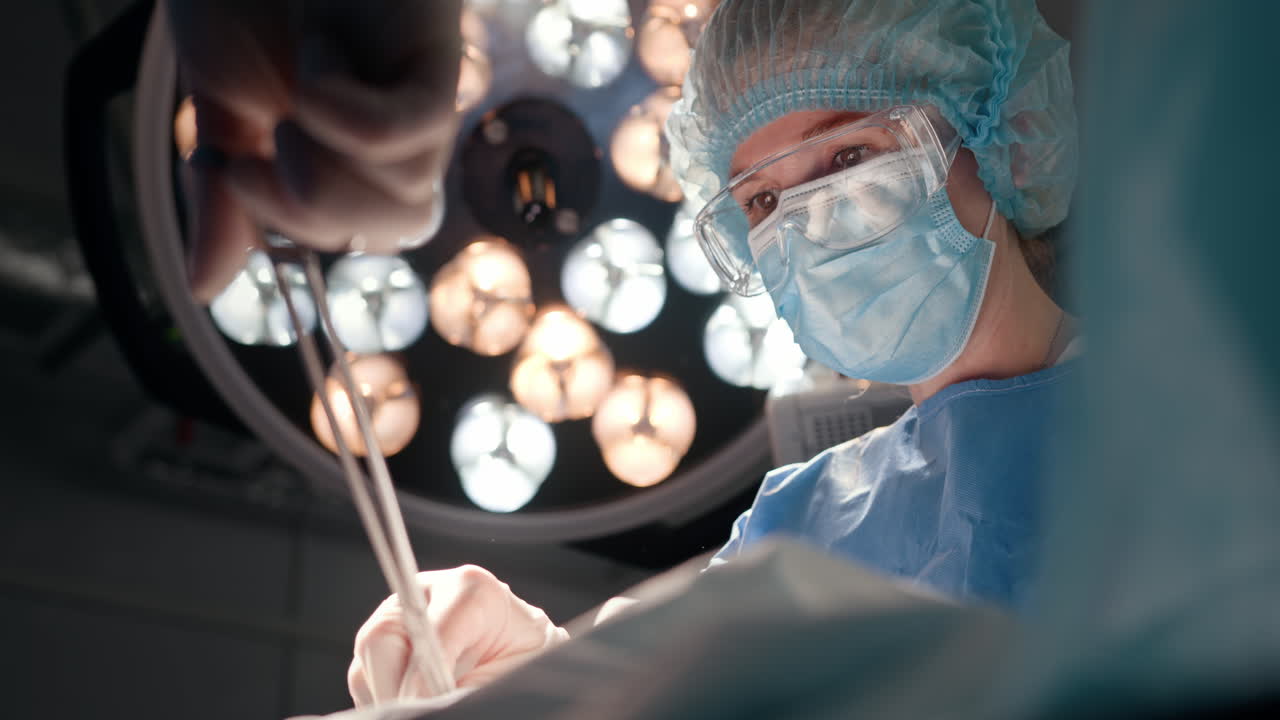 Surgeon performing a surgical procedure in an operating room