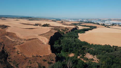 aerial view of a canyon and farmland