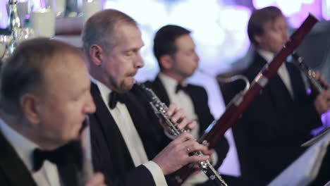 four musicians in restaurant