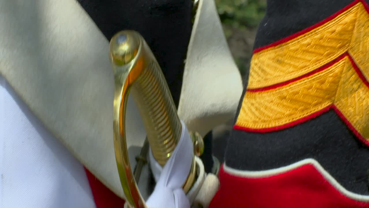 Costume of a French Napoleon soldier with sword. Battle of Waterloo