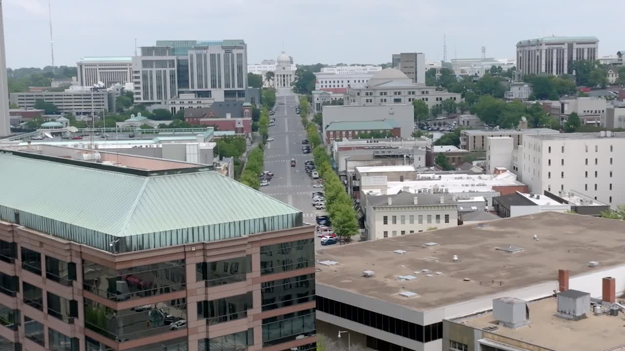 Montgomery, Alabama skyline and Alabama state capitol building parallax view with drone video moving in