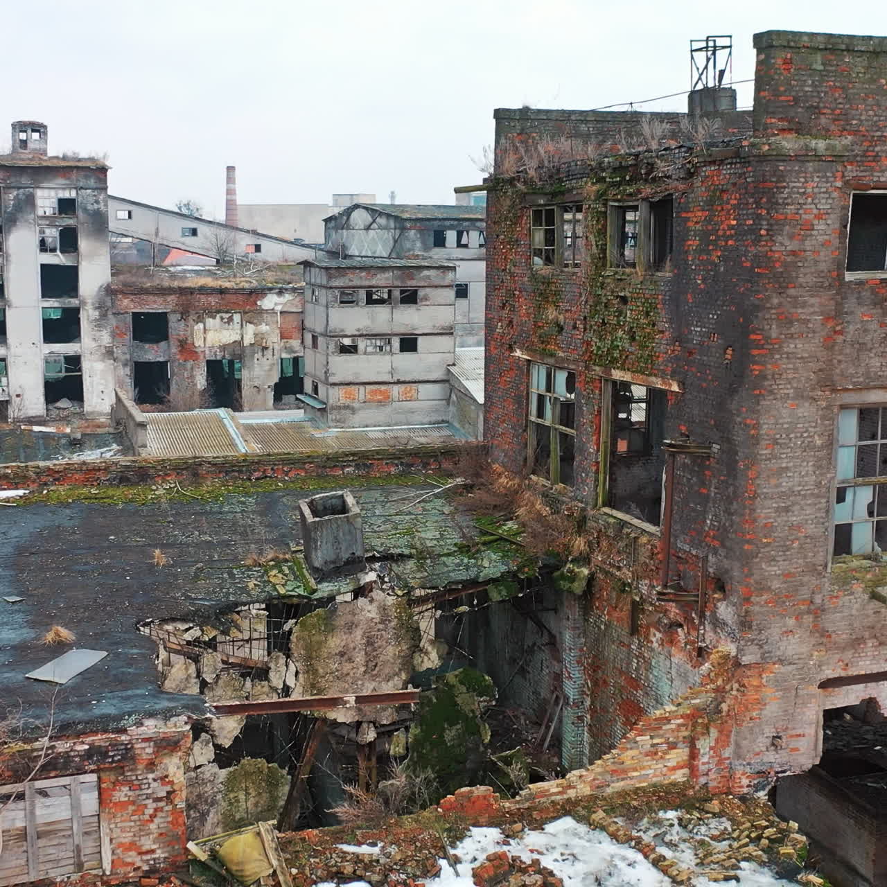 Abandoned industrial building. Ruins of an old factory. Aerial view